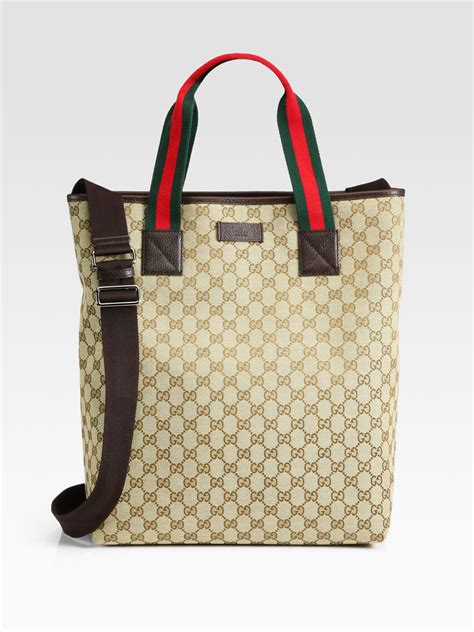 mens gucci tote|gucci luggage for men.